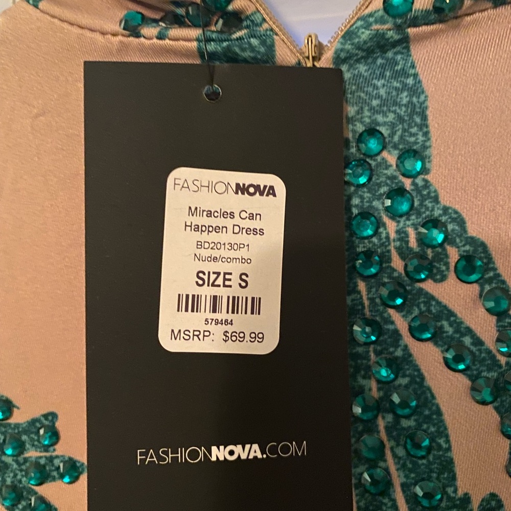 Fashion nova dress. Nude with green rhinestones. Form fitting.
